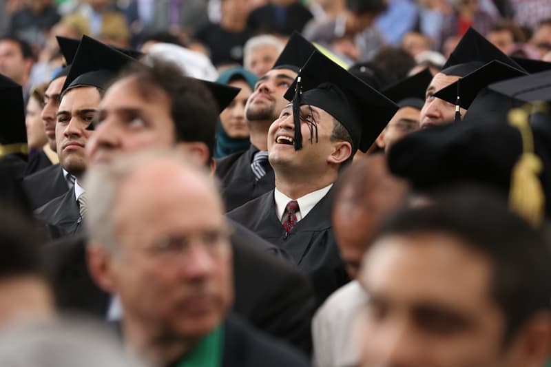 Mosa Rahimi celebrating his graduation from the American University of Afghanistan