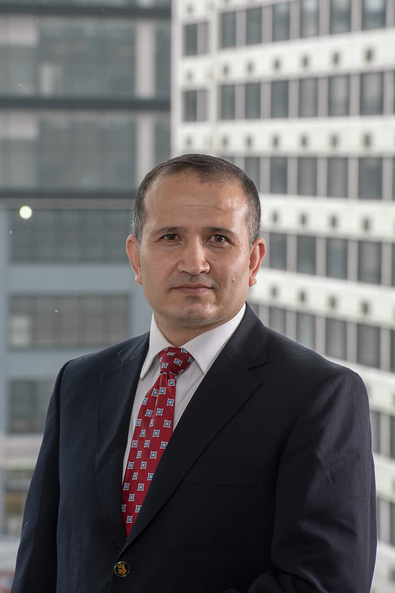 Mosa Rahimi in a dark suit